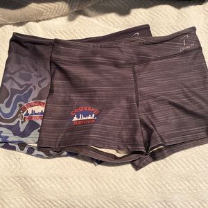 Two pair of gray Crossfit Midtown compression shorts